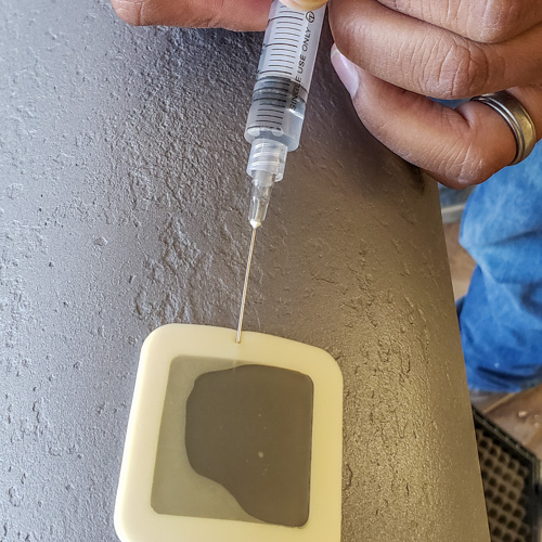 Soluble salts testing in progress to determine if salt contamination is present on the substrate surface following abrasive blasting and prior to coating. Such contamination could result in blistering and premature coating failure.